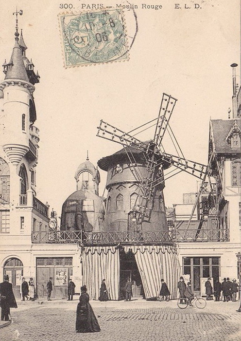 Старая открытка, на которой рядом с мельницей можно увидеть слона